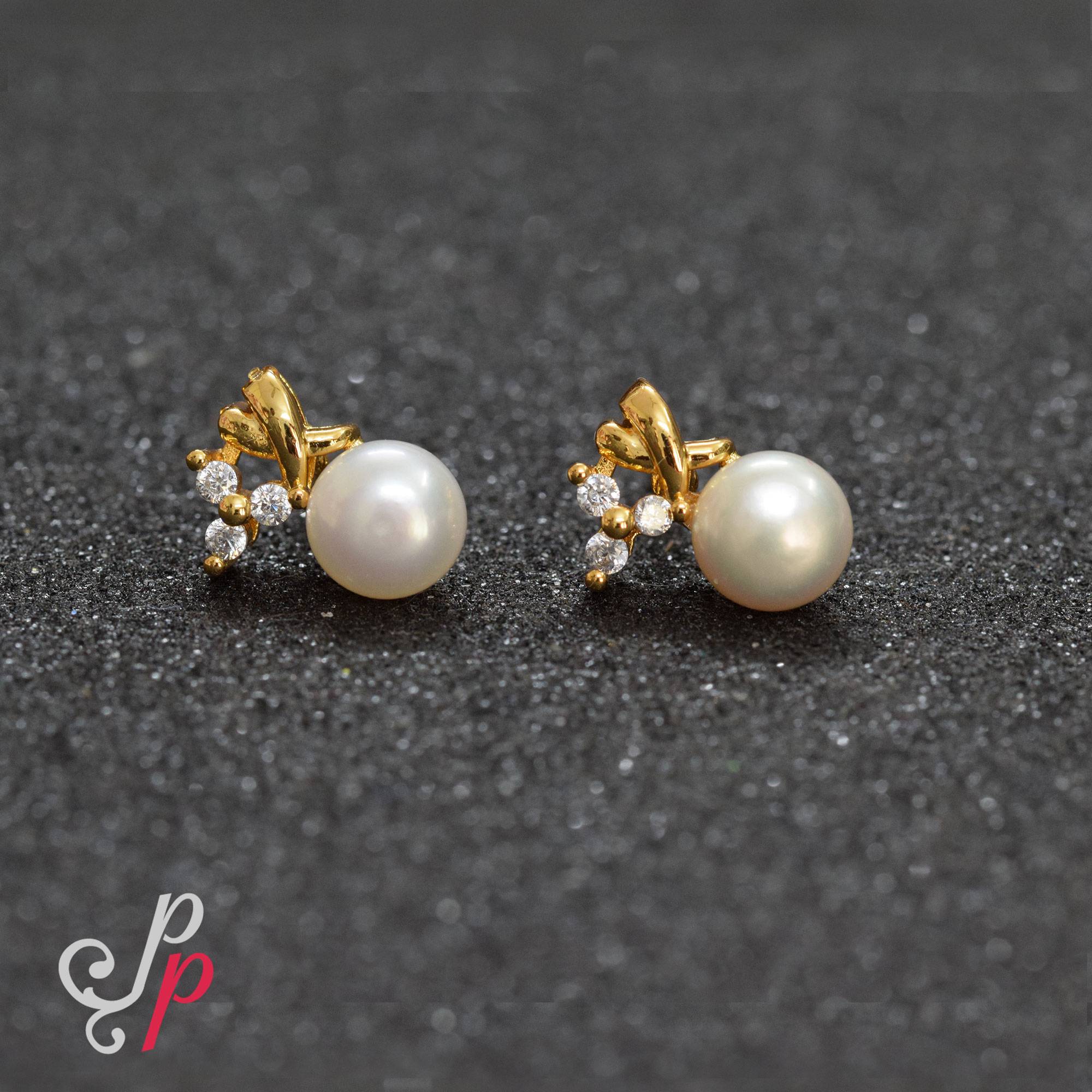 Stylish Pearl Studs in American Diamonds
