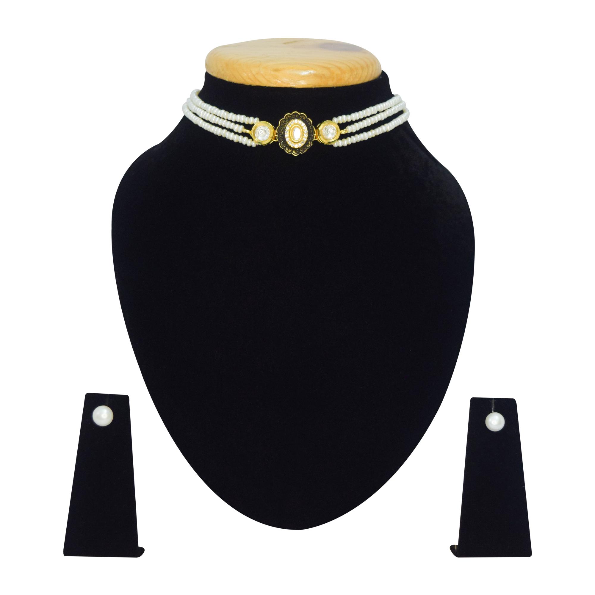 Well crafted three-row white pearl choker with one of a kind black enamel kundan pendant