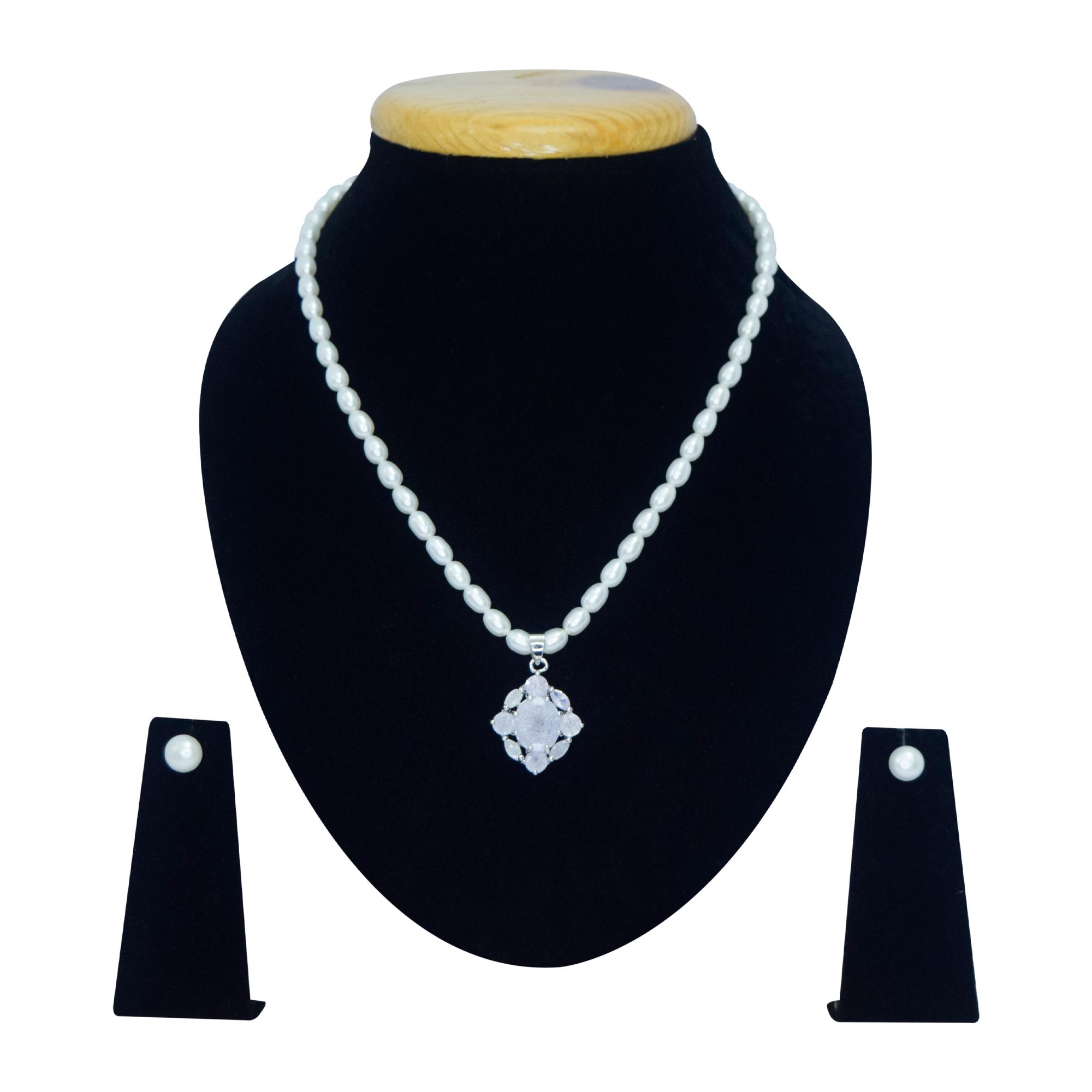 Well crafted white oval pearl necklace set with a subtle sandstone pendant