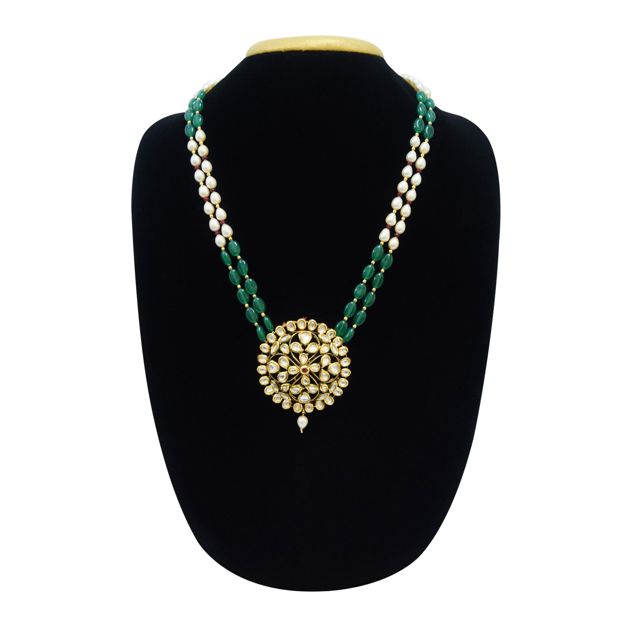 Double row rich light pink/peach pear-shaped pearls haar with an intricate Kundan pendant