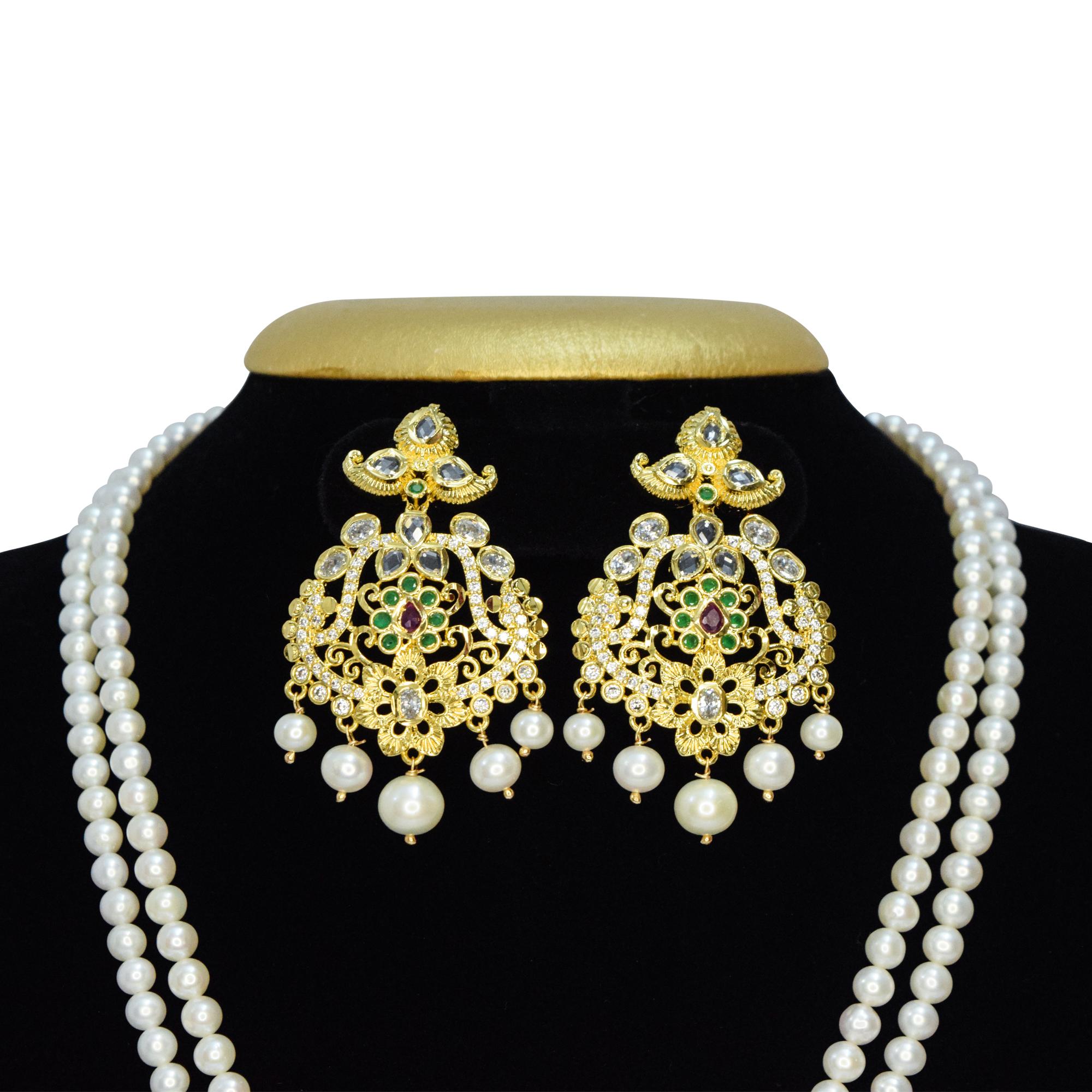 Two-row white round pearls necklace with a splendid golden finish traditional pendant studded with zircons, SP rubies & SP emeralds - earrings