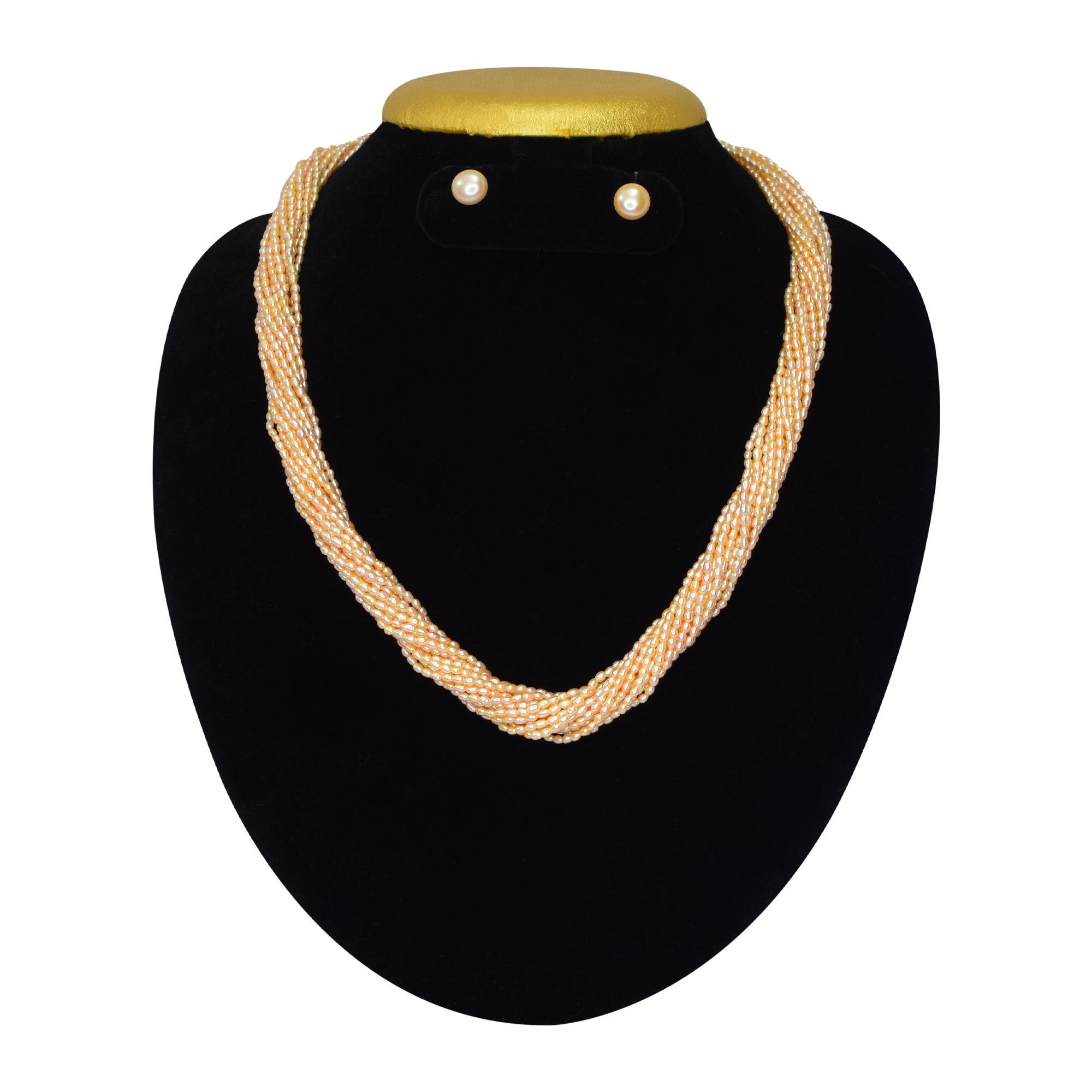 Stunning 15 strands of peach rice pearls finely crafted to a long 20-inch necklace - twisted
