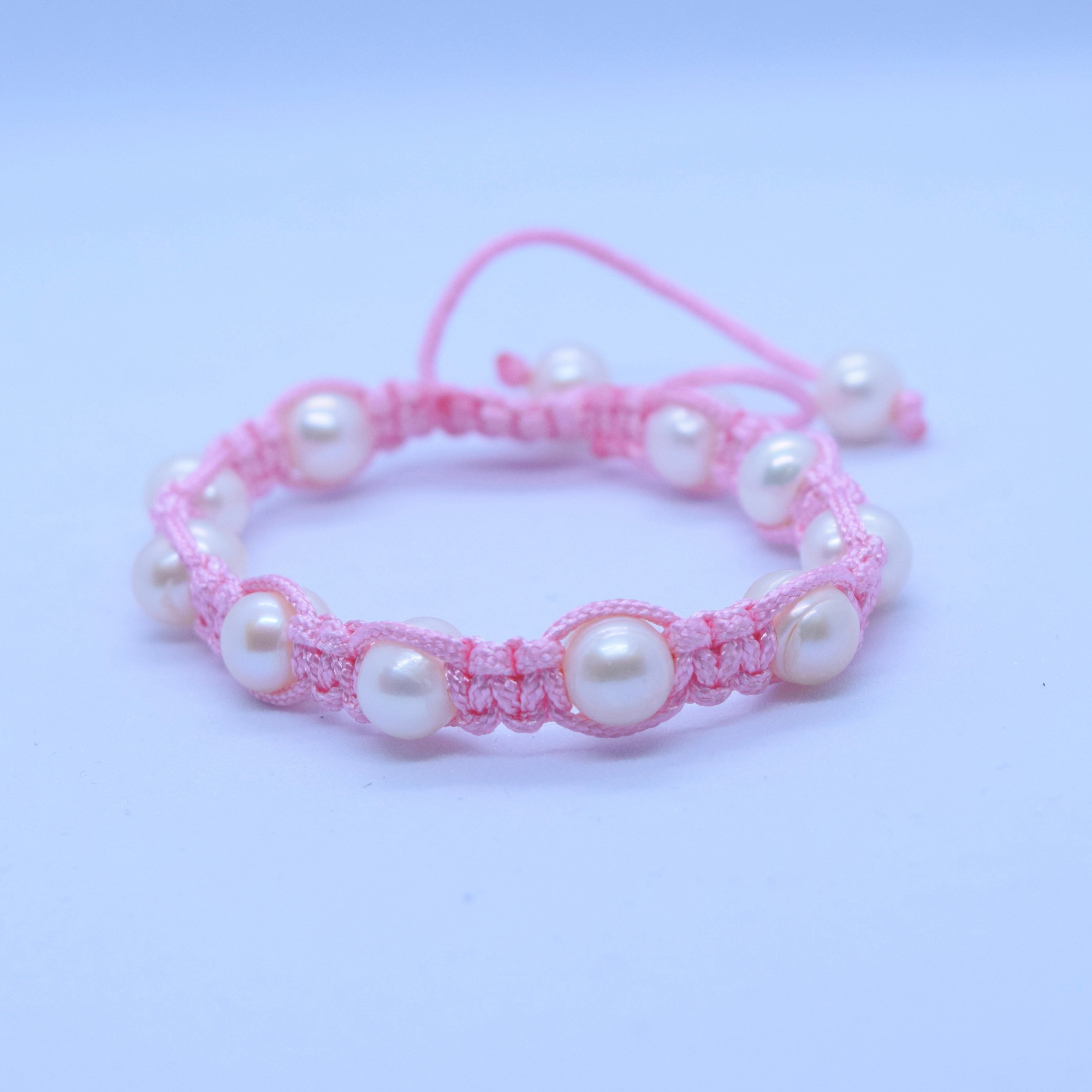 Delightful Pink Macrame Bracelet With White Pearls