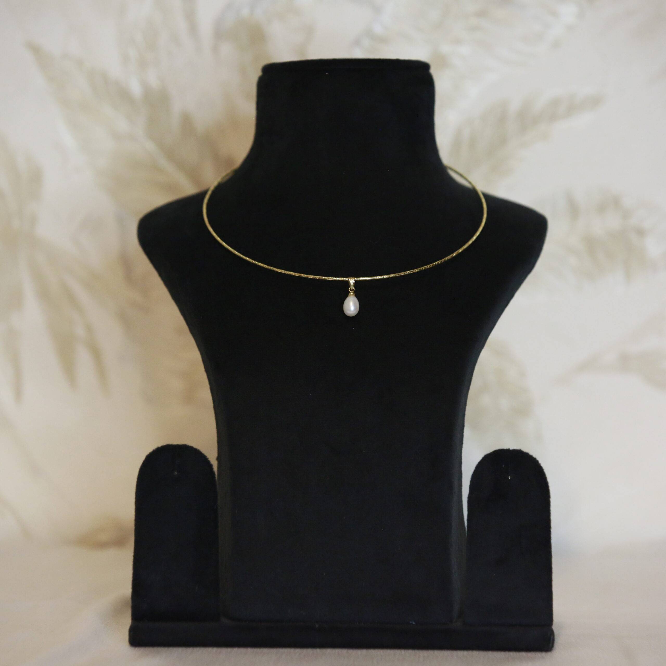 Lustrous Gold Finish Pendant Accentuated With 7mm Oval White Pearl-1