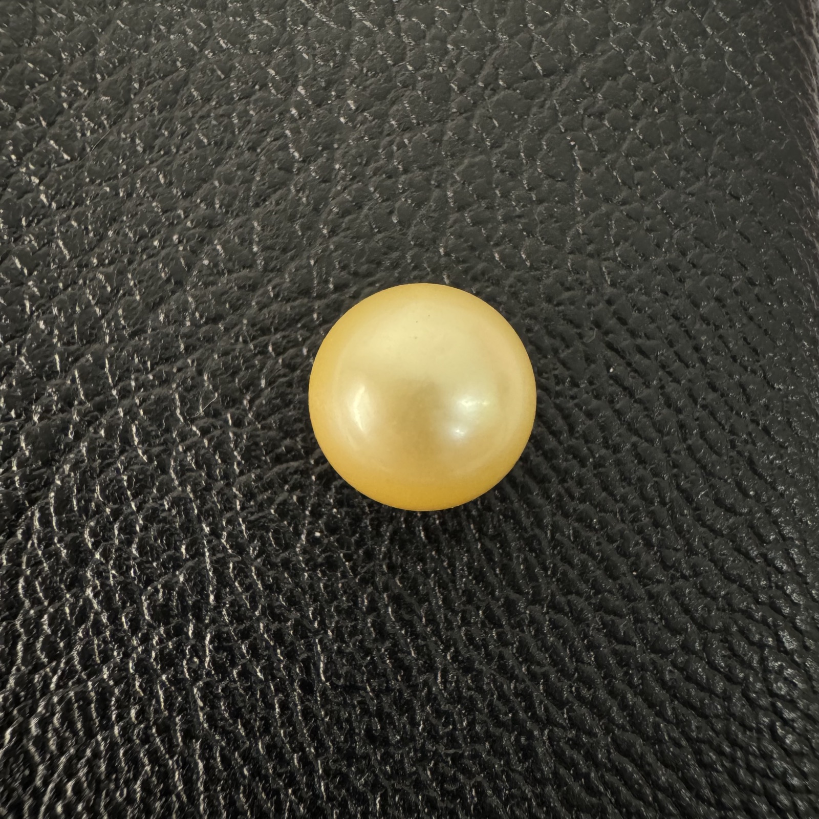 Second view of a 9.4mm golden South Sea loose pearl showing lustre and surface - Pure Pearls