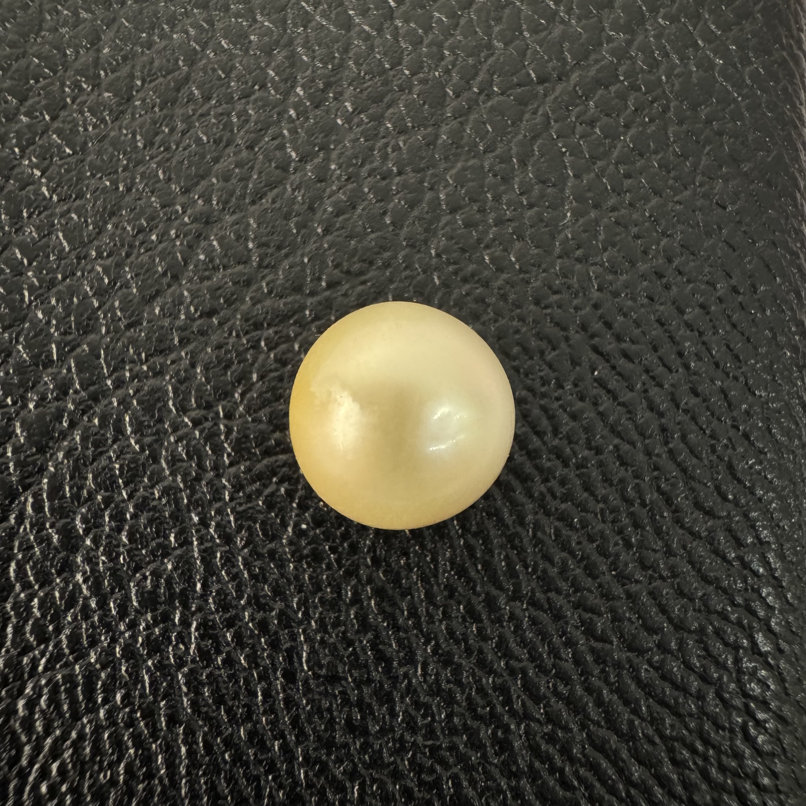 Second view of a 9.4mm golden South Sea loose pearl showing lustre and surface - Pure Pearls