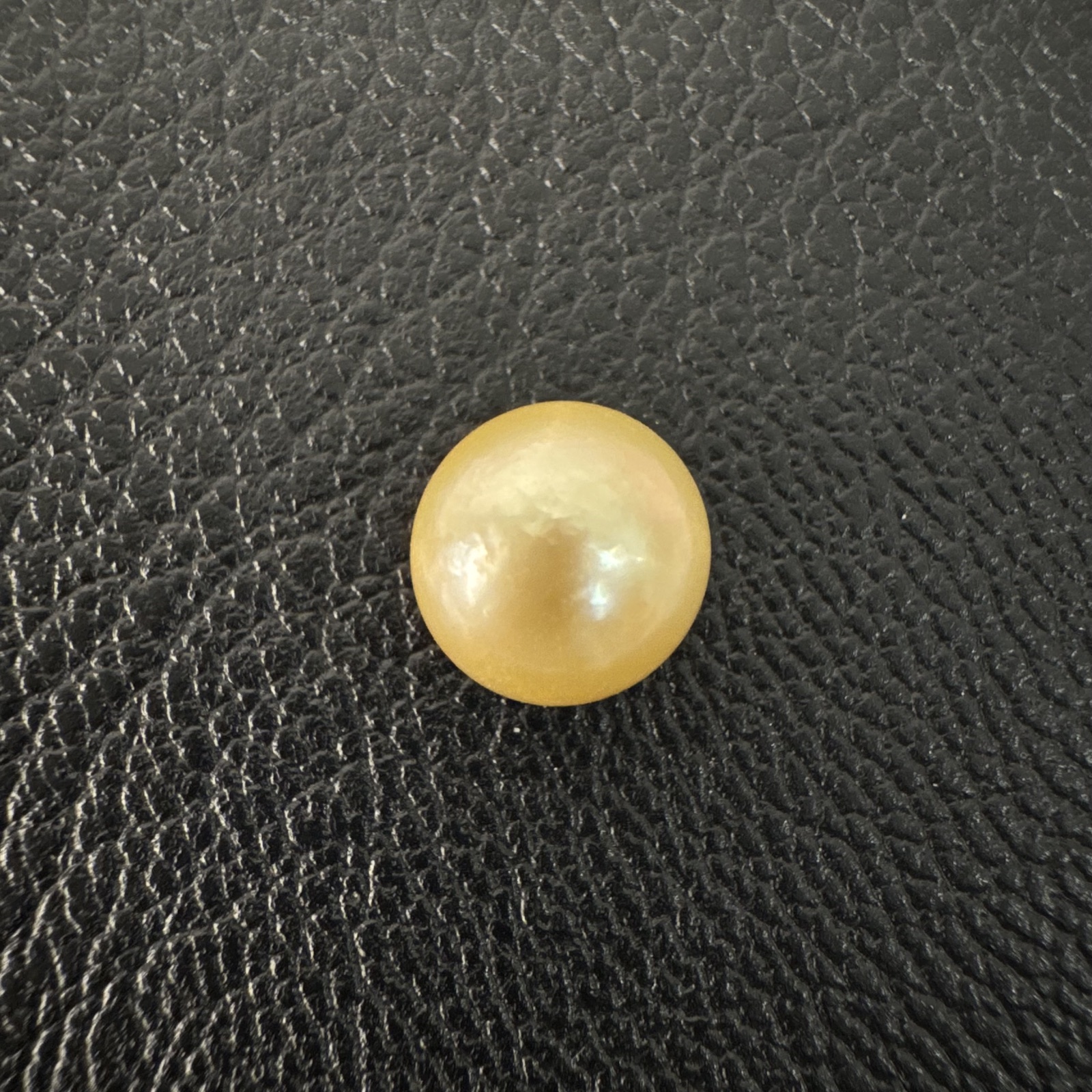 Second view of a 9.6mm golden South Sea loose pearl showing lustre and surface - Pure Pearls