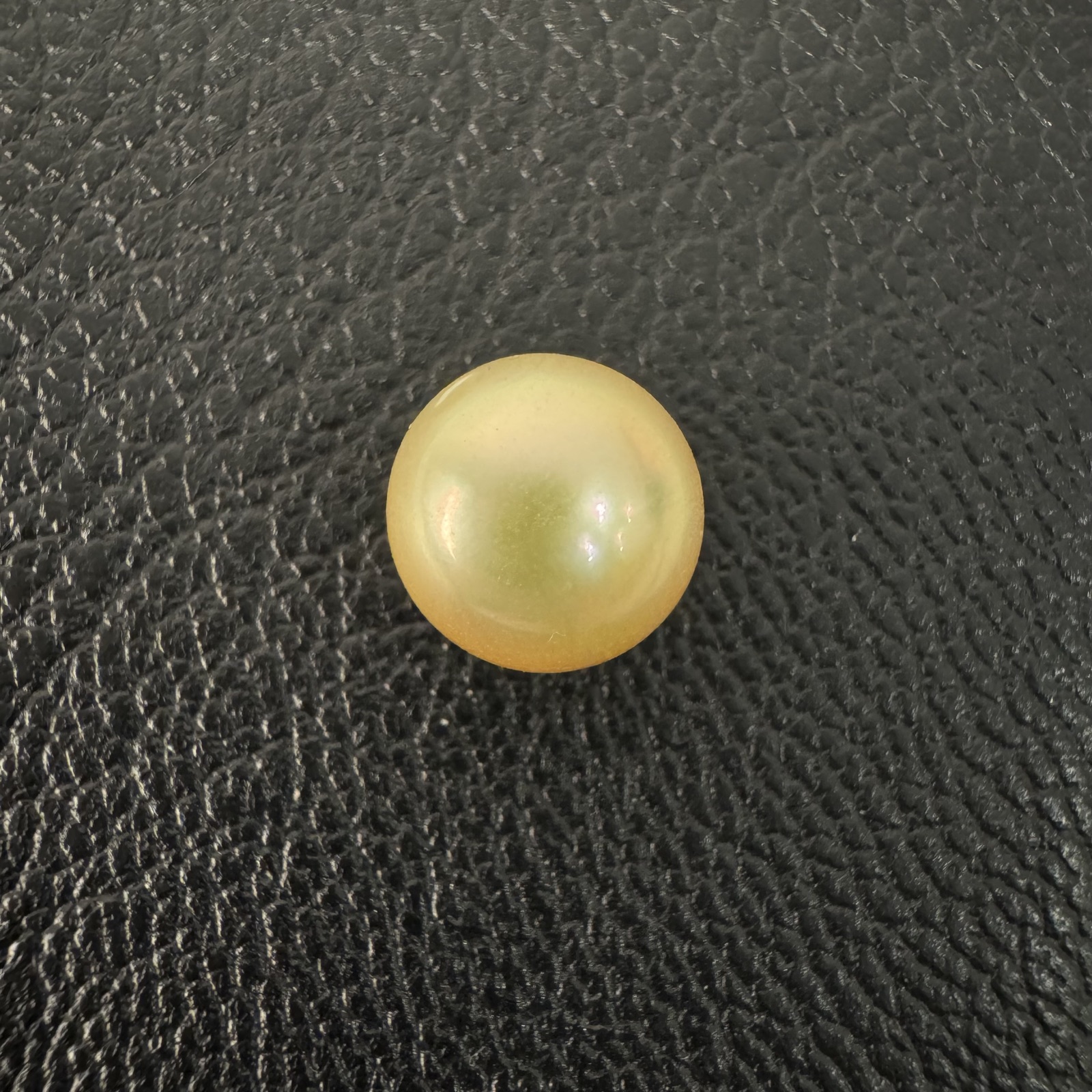 Second view of a 9.8mm golden South Sea loose pearl showing lustre and surface - Pure Pearls