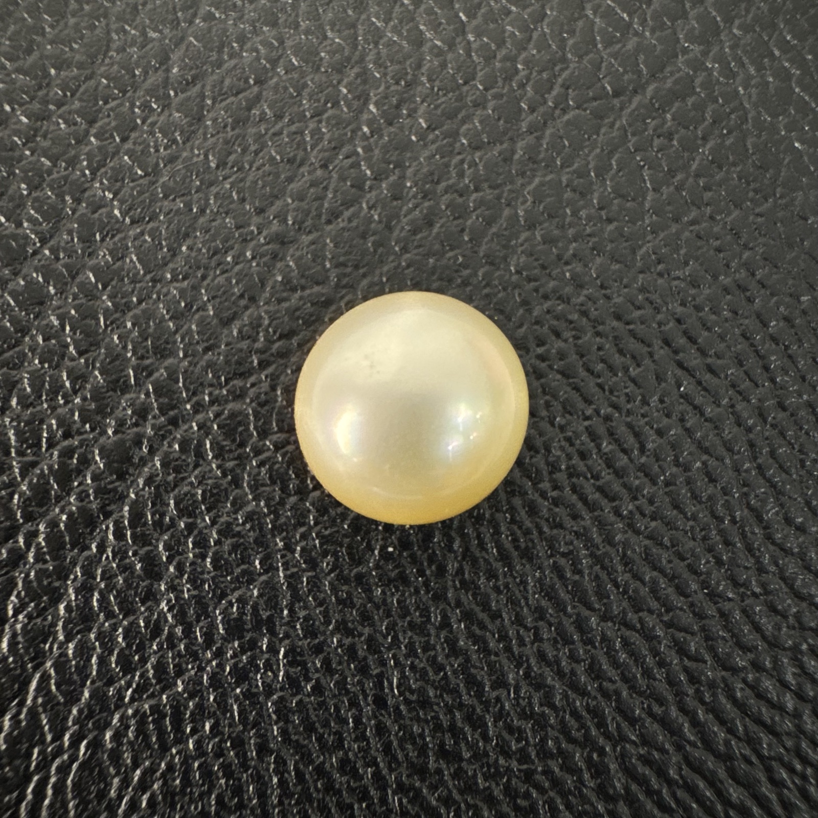 Second view of a 9.8mm golden South Sea loose pearl showing lustre and surface - Pure Pearls