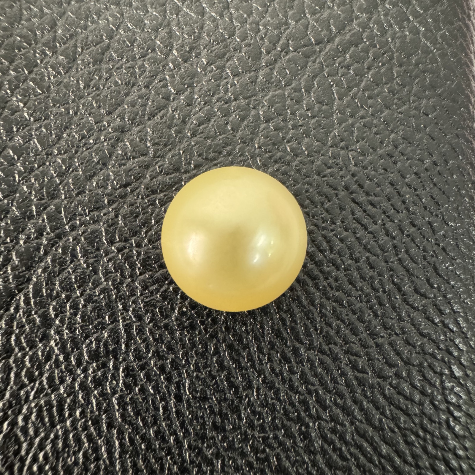 Second view of a 10mm golden South Sea loose pearl showing lustre and surface - Pure Pearls
