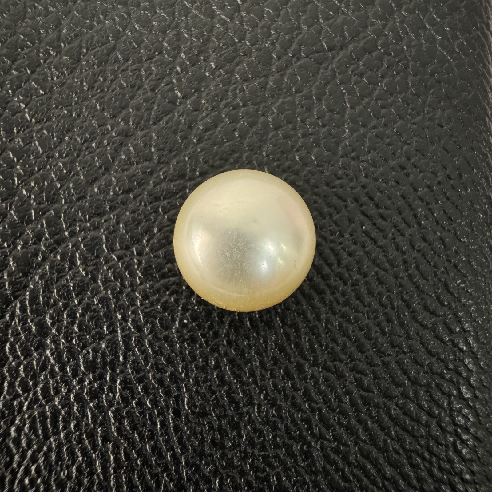 Second view of a 10mm golden South Sea loose pearl showing lustre and surface - Pure Pearls