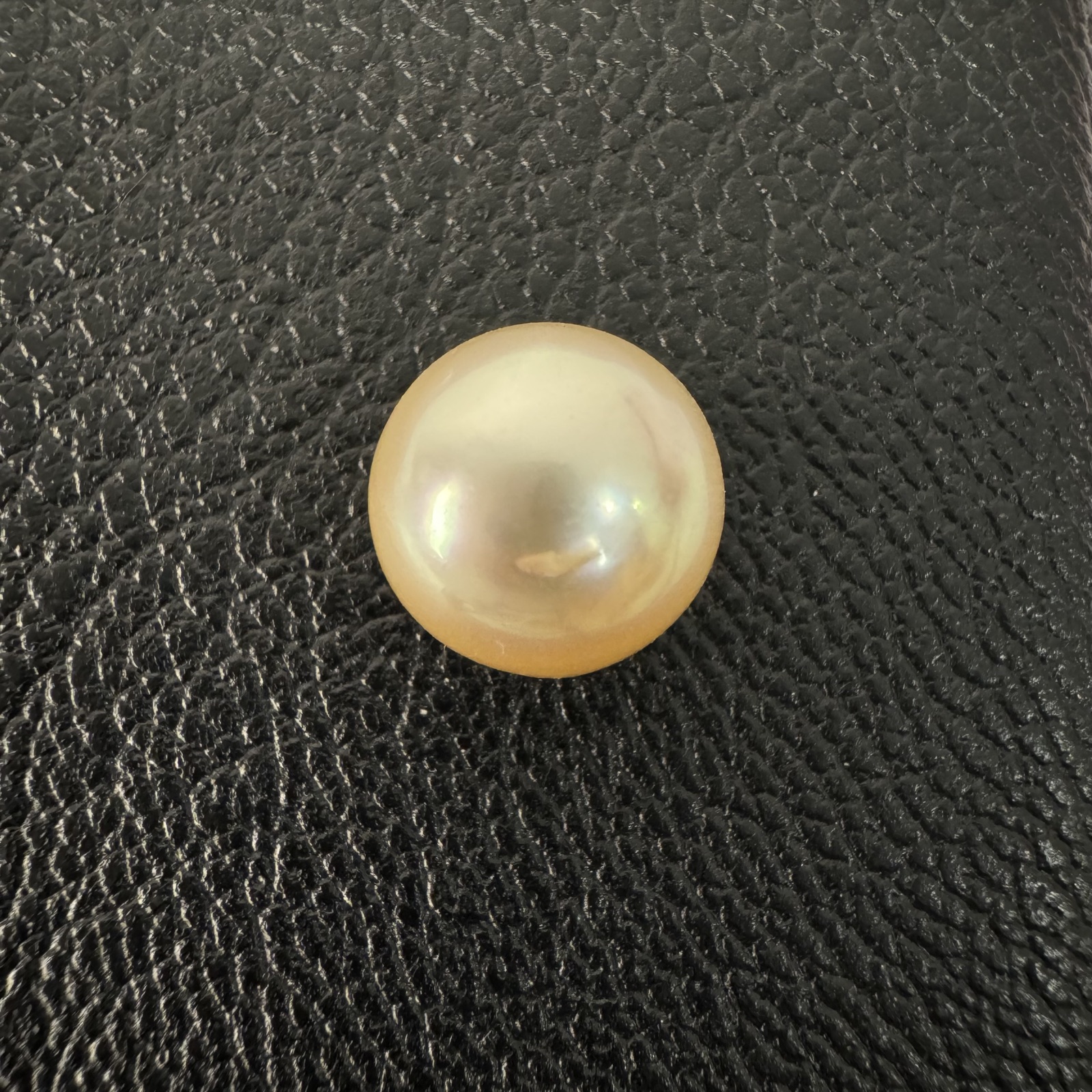 Second view of a 10.8mm golden South Sea loose pearl showing lustre and surface - Pure Pearls