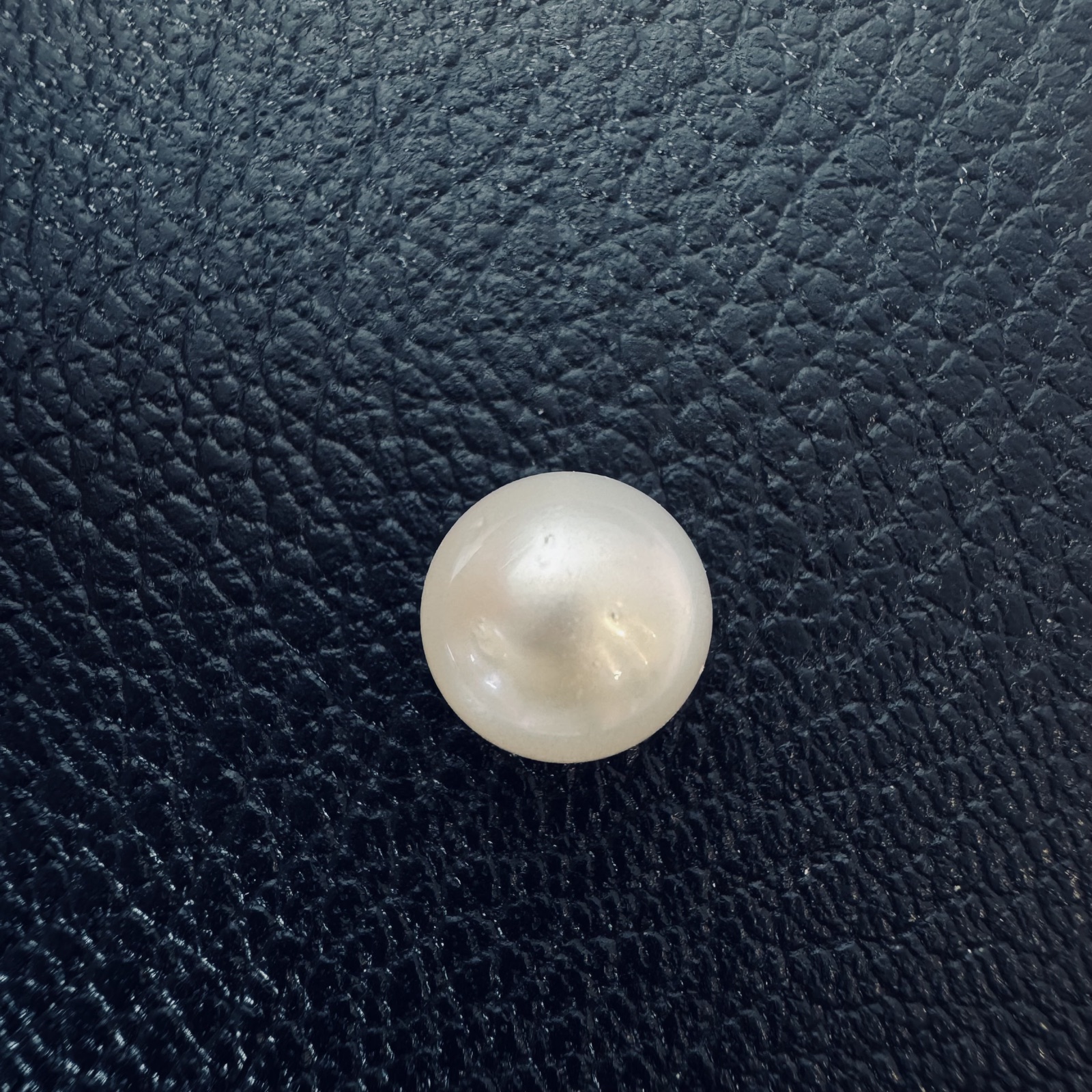 Second view of a 9mm white South Sea loose pearl showing lustre and surface - Pure Pearls
