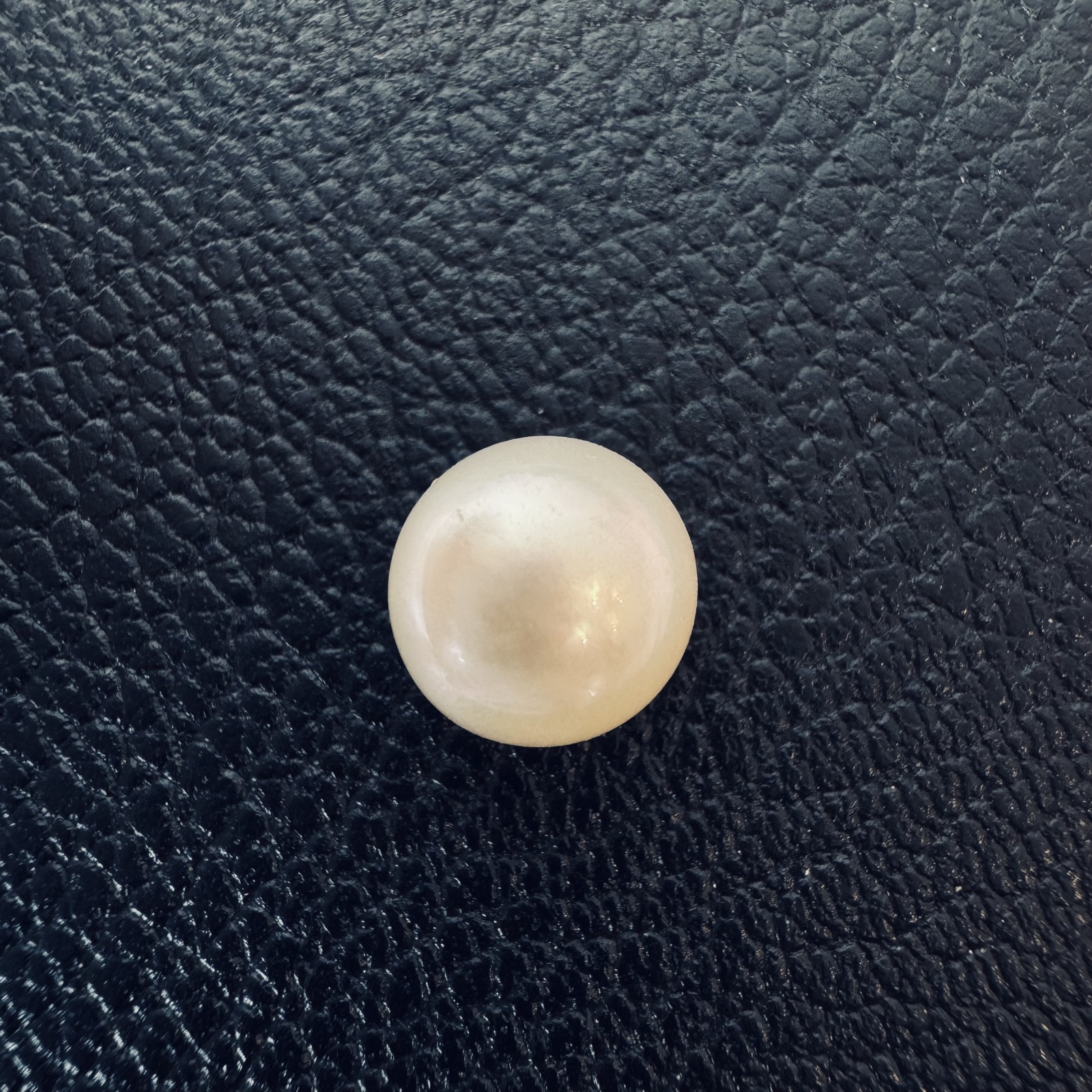 Second view of a 9.4mm white South Sea loose pearl showing lustre and surface - Pure Pearls
