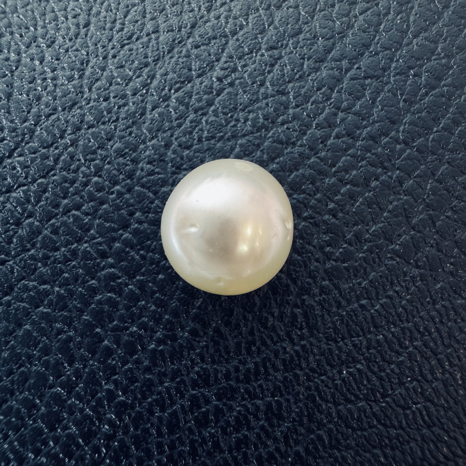 Second view of a 9.8mm white South Sea loose pearl showing lustre and surface - Pure Pearls