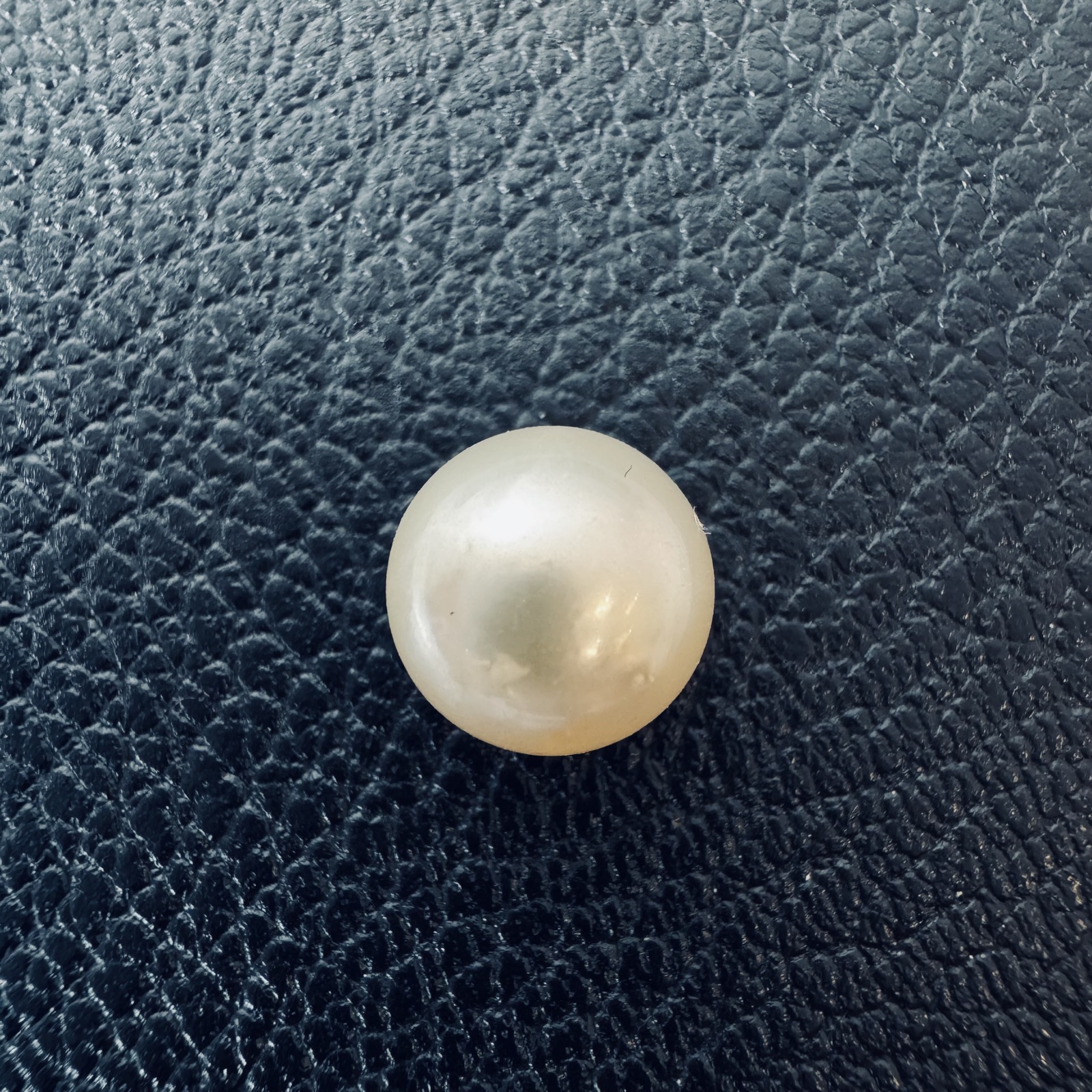 Second view of a 9.9mm white South Sea loose pearl showing lustre and surface - Pure Pearls