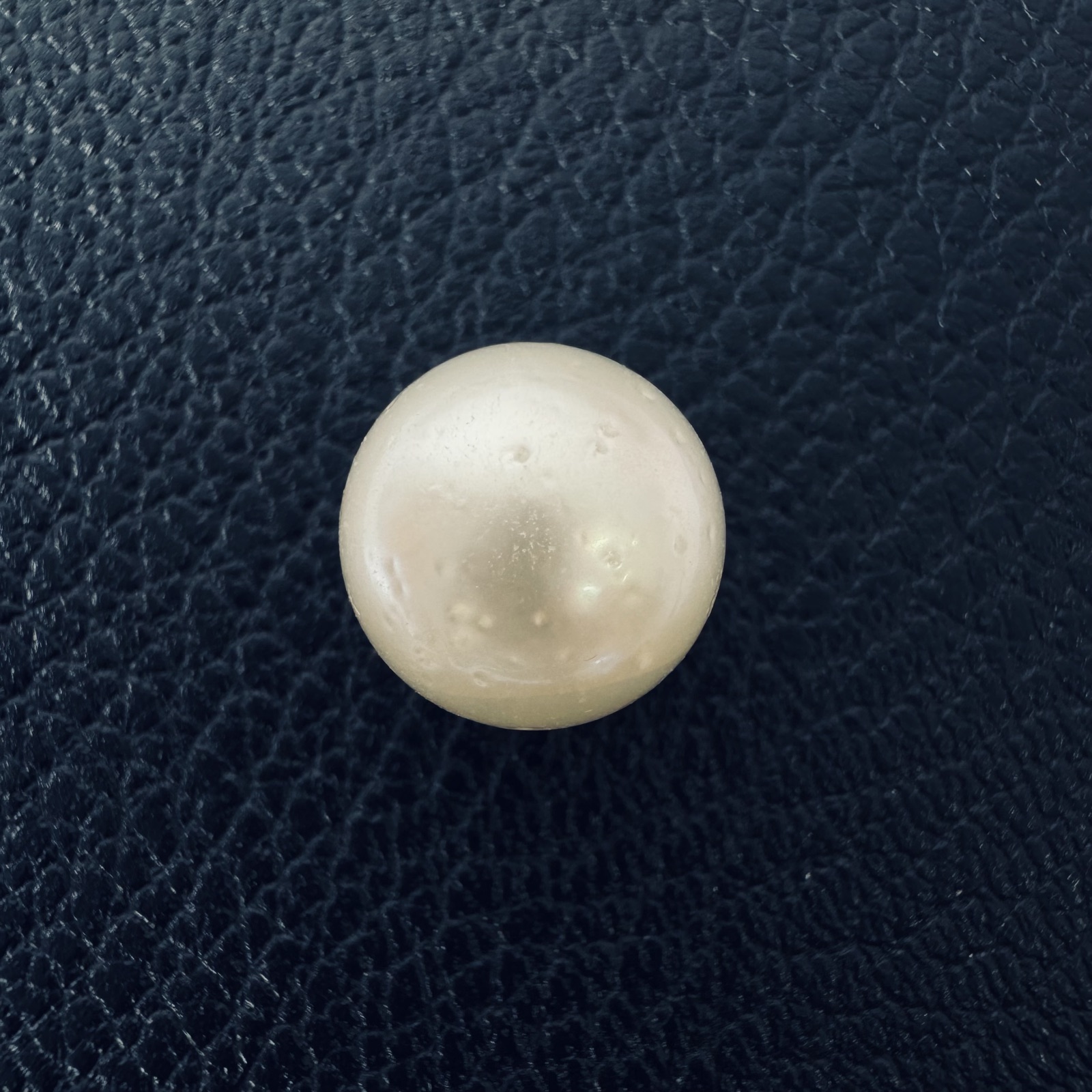 Second view of a 11.4mm white South Sea loose pearl showing lustre and surface - Pure Pearls